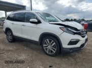 ✅ 2017 Honda Pilot Elite • VIN: 5FNYF6H07HB103244 • Лот: 86704655. Опубликован ранее на Copart с пробегом 172 360 миль. Бесплатный доступ к архиву аукционных продаж из США и подробный отчёт об истории автомобиля на DreamBid. Изображение 4.