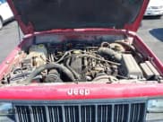 ✅ 1996 Jeep Cherokee Sport • VIN: 1J4FT68S0TL225719 • Lot: 42121351. Listed on IAAI with 237,602 mi. Free auction sales archive from the USA and detailed vehicle history report at DreamBid. Image 10.