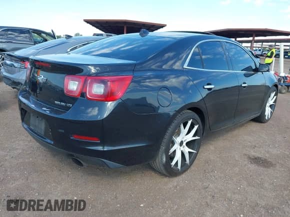 2013 Chevrolet Malibu LTZ with VIN 1G11J5SX0DF273704, listed as a IAAI auction lot 42607091 with 156,489 mi miles and . Bid and sale history available at DreamBid. Image 4.