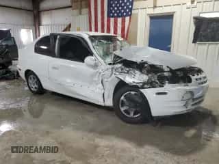 2005 Hyundai Accent GLS with VIN KMHCG35C55U346571, listed as a Copart auction lot 81104844 with Not provided miles and Salvage title. Bid and sale history available at DreamBid. Image 4.