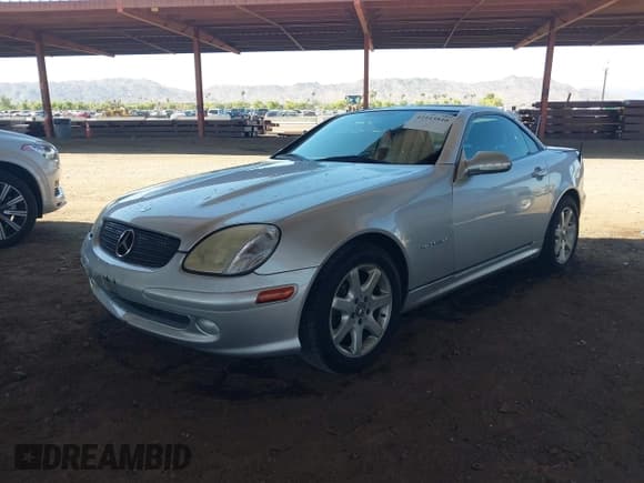 ✅ 2002 Mercedes-Benz SLK 230 Kompressor • VIN: WDBKK49FX2F251009 • Lot: 42443840. Listed on IAAI with 82,655 mi. Free auction sales archive from the USA and detailed vehicle history report at DreamBid. Image 2.
