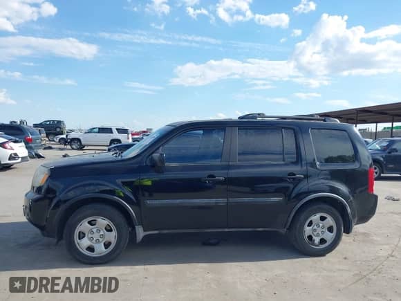 2009 Honda Pilot LX with VIN 5FNYF38239B004504, listed as a IAAI auction lot 43382186 with 218,342 mi miles and . Bid and sale history available at DreamBid. Image 14.