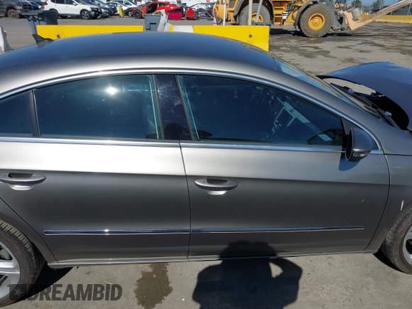 ✅ 2013 Volkswagen CC R-Line • VIN: WVWBP7AN5DE516953 • Lot: 42920630. Listed on IAAI with 107,428 mi. Free auction sales archive from the USA and detailed vehicle history report at DreamBid. Image 13.