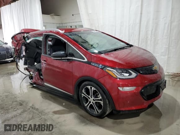 ✅ 2021 Chevrolet Bolt EV Premier • VIN: 1G1FZ6S09M4106793 • Lot: 54512305. Listed on Copart with 86,776 mi. Free auction sales archive from the USA and detailed vehicle history report at DreamBid. Image 4.