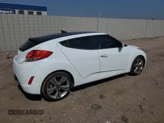 2013 Hyundai Veloster w/Black Int z VIN KMHTC6AD2DU099052, wystawiony jako Copart lot #60487975 z przebiegiem 126 762 mil mil oraz Czysty tytuł • Clean title. Historia ofert i sprzedaży dostępna na DreamBid. Obrazek 3.