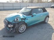 ✅ 2018 MINI Convertible Cooper • VIN: WMWWG5C5XJ3D00719 • Lot: 93783995. Wystawiony na Copart z przebiegiem 22 150 mil. Bezpłatny archiwum sprzedaży aukcyjnych z USA i szczegółowy raport historii pojazdu na DreamBid. Zdjęcie 1.