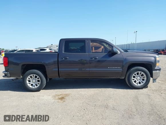 ✅ 2015 Chevrolet Silverado 1500 LT • VIN: 3GCPCREC4FG136973 • Lot: 42017401. Listed on IAAI with 125,176 mi. Free auction sales archive from the USA and detailed vehicle history report at DreamBid. Image 13.