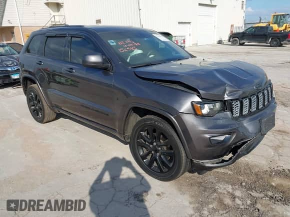 2018 Jeep Grand Cherokee Altitude z VIN 1C4RJFAG6JC312892, wystawiony jako IAAI lot #43382592 z przebiegiem 54 779 mil mil oraz . Historia ofert i sprzedaży dostępna na DreamBid. Obrazek 1.