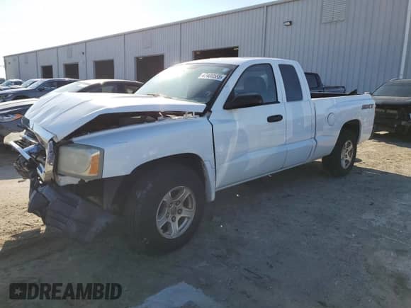 2007 Dodge Dakota ST z VIN 1D7HW22K57S216328, wystawiony jako Copart lot #47400585 z przebiegiem Nie podano mil oraz Szkoda całkowita • Salvage title. Historia ofert i sprzedaży dostępna na DreamBid. Obrazek 1.