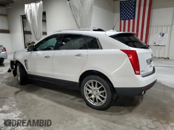 ✅ 2013 Cadillac SRX Premium Collection • VIN: 3GYFNJE32DS571017 • Лот: 90260825. Опубликован ранее на Copart с пробегом 135 219 миль. Бесплатный доступ к архиву аукционных продаж из США и подробный отчёт об истории автомобиля на DreamBid. Изображение 2.