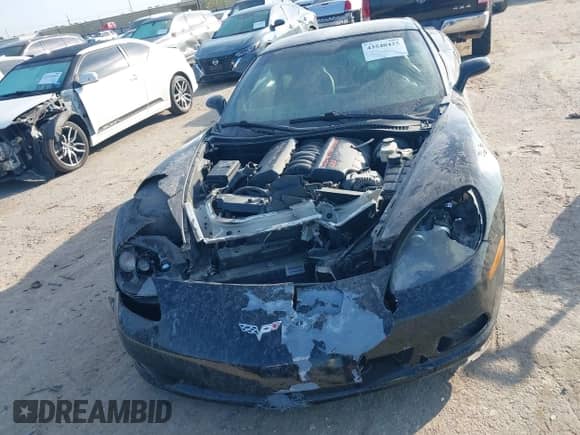 2009 Chevrolet Corvette 1LT z VIN 1G1YY25W895100585, wystawiony jako IAAI lot #43540425 z przebiegiem Nie podano mil oraz . Historia ofert i sprzedaży dostępna na DreamBid. Obrazek 6.