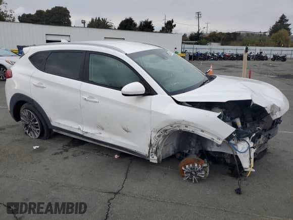 2019 Hyundai Tucson Ultimate with VIN KM8J3CAL6KU018158, listed as a Copart auction lot 86689155 with 127,030 mi miles and Salvage title. Bid and sale history available at DreamBid. Image 4.