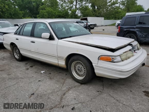 ✅ 1997 Ford Crown Victoria LX • VIN: 2FALP74WXVX114442 • Lot: 59524075. Listed on Copart with 138,450 mi. Free auction sales archive from the USA and detailed vehicle history report at DreamBid. Image 4.