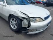 ✅ 2001 Lexus ES 300 • VIN: JT8BF28G710327189 • Lot: 42911574. Wystawiony na IAAI z przebiegiem 103 200 mil. Bezpłatny archiwum sprzedaży aukcyjnych z USA i szczegółowy raport historii pojazdu na DreamBid. Zdjęcie 6.