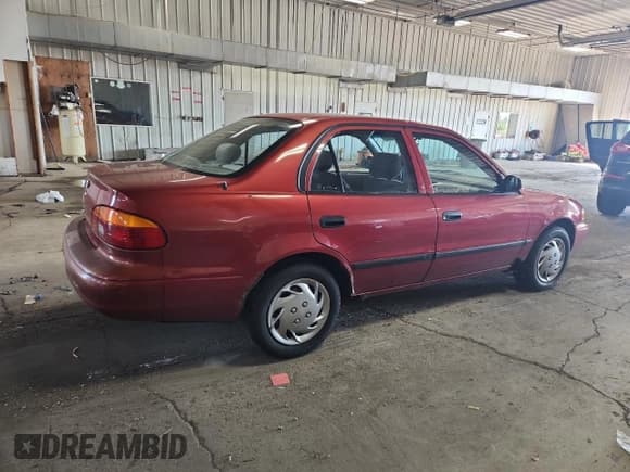 ✅ 2002 Chevrolet Prizm • VIN: 1Y1SK52892Z426900 • Lot: 80184925. Listed on Copart with 124,937 mi. Free auction sales archive from the USA and detailed vehicle history report at DreamBid. Image 3.