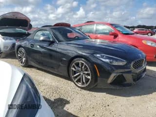 ✅ 2022 BMW Z4 sDriveM40i • VIN: WBAHF9C04NWX90938 • Лот: 74031664. Опубликован ранее на Copart с пробегом 7 813 миль. Бесплатный доступ к архиву аукционных продаж из США и подробный отчёт об истории автомобиля на DreamBid. Изображение 4.