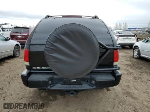 ✅ 2005 Chevrolet Blazer LS • VIN: 1GNCT18X65K103468 • Lot: 51663025. Wystawiony na Copart z przebiegiem 180 451 mil. Bezpłatny archiwum sprzedaży aukcyjnych z USA i szczegółowy raport historii pojazdu na DreamBid. Zdjęcie 6.