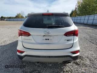2018 Hyundai Santa Fe 2.0T z VIN 5XYZUDLA7JG557507, wystawiony jako Copart lot #84480945 z przebiegiem 106 770 mil mil oraz Czysty tytuł • Clean title. Historia ofert i sprzedaży dostępna na DreamBid. Obrazek 6.