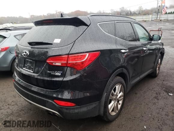 ✅ 2015 Hyundai Santa Fe • VIN: 5XYZWDLA0FG239150 • Лот: 65664442. Опубликован ранее на Copart с пробегом 107 911 миль. Бесплатный доступ к архиву аукционных продаж из США и подробный отчёт об истории автомобиля на DreamBid. Изображение 4.