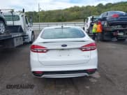 ✅ 2018 Ford Fusion Titanium • VIN: 3FA6P0D96JR188514 • Lot: 43390135. Listed on IAAI with 115,058 mi. Free auction sales archive from the USA and detailed vehicle history report at DreamBid. Image 16.