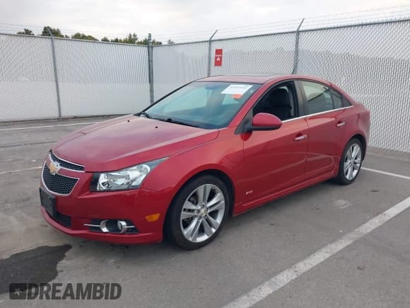 ✅ 2012 Chevrolet Cruze LTZ • VIN: 1G1PH5SC7C7316771 • Лот: 43451642. Опубликован ранее на IAAI с пробегом 133 334 миль. Бесплатный доступ к архиву аукционных продаж из США и подробный отчёт об истории автомобиля на DreamBid. Изображение 2.