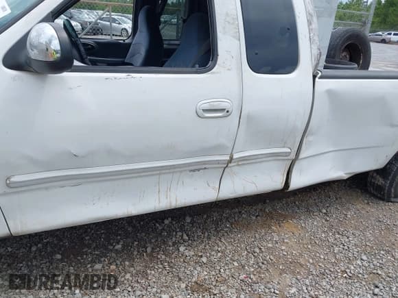 ✅ 1999 Ford F-150 XL • VIN: 1FTRX17L2XNB70799 • Lot: 42762580. Listed on IAAI with Not provided. Free auction sales archive from the USA and detailed vehicle history report at DreamBid. Image 12.