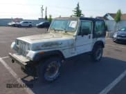 ✅ 1990 Jeep Wrangler S • VIN: 2J4FY19E5LJ525128 • Lot: 42539940. Listed on IAAI with 132,043 mi. Free auction sales archive from the USA and detailed vehicle history report at DreamBid. Image 2.