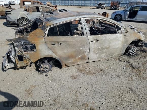 ✅ 2022 Toyota Prius LE • VIN: JTDKAMFP6N3197411 • Lot: 59794995. Listed on Copart with Not provided. Free auction sales archive from the USA and detailed vehicle history report at DreamBid. Image 3.