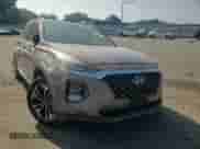 2019 Hyundai Santa Fe Limited z VIN 5NMS5CAA2KH112501, wystawiony jako Copart lot #68364355 z przebiegiem Nie podano mil oraz Szkoda całkowita • Salvage title. Historia ofert i sprzedaży dostępna na DreamBid. Obrazek 14.