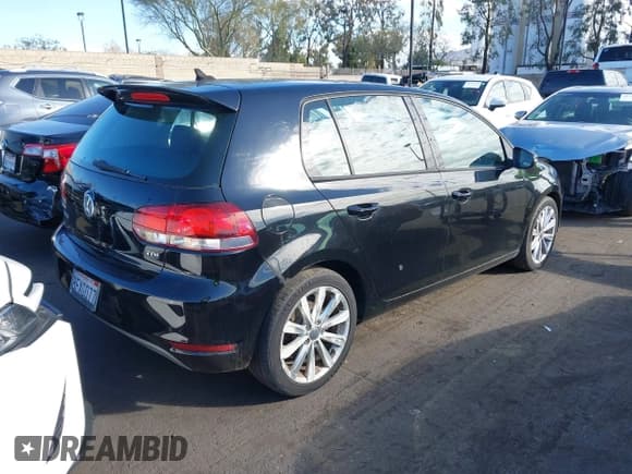 ✅ 2012 Volkswagen Golf TDI • VIN: WVWDM7AJ4CW040234 • Lot: 43721961. Listed on IAAI with 52,765 mi. Free auction sales archive from the USA and detailed vehicle history report at DreamBid. Image 4.