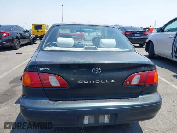 ✅ 1999 Toyota Corolla VE • VIN: 1NXBR12E4XZ251809 • Lot: 42910359. Listed on IAAI with 150,200 mi. Free auction sales archive from the USA and detailed vehicle history report at DreamBid. Image 16.
