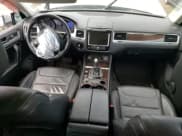 ✅ 2013 Volkswagen Touareg Exec • VIN: WVGEF9BP6DD011274 • Lot: 50680105. Listed on Copart with 96,336 mi. Free auction sales archive from the USA and detailed vehicle history report at DreamBid. Image 8.