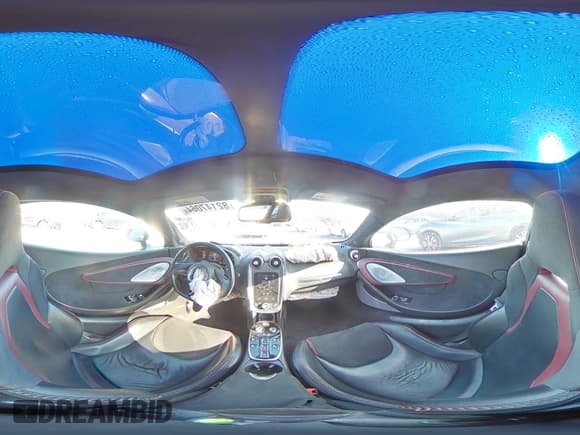 ✅ 2021 McLaren GT • VIN: SBM22GCA8MW001374 • Lot: 82147064. Listed on Copart with 32,562 mi. Free auction sales archive from the USA and detailed vehicle history report at DreamBid. Image 15.