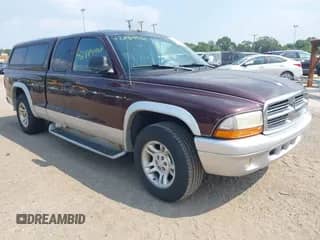 2004 Dodge Dakota SLT with VIN 1D7GL42K04S633433, listed as a IAAI auction lot 42884960 with 191,381 mi miles and . Bid and sale history available at DreamBid. Image 1.