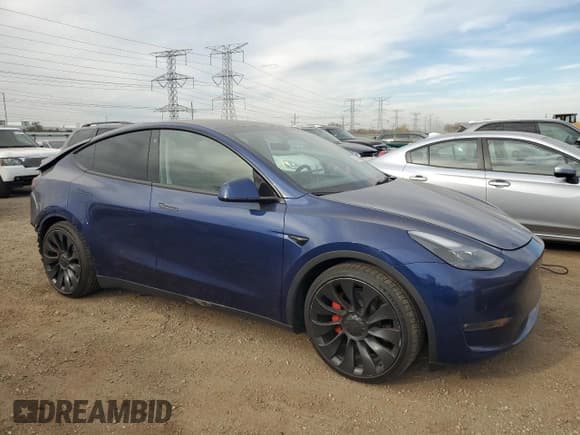 ✅ 2022 Tesla Model Y Performance • VIN: 7SAYGDEFXNF539871 • Lot: 90124115. Listed on Copart with 38,046 mi. Free auction sales archive from the USA and detailed vehicle history report at DreamBid. Image 4.