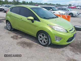 ✅ 2013 Ford Fiesta Titanium • VIN: 3FADP4FJ5DM118042 • Lot: 42678455. Wystawiony na IAAI z przebiegiem 129 249 mil. Bezpłatny archiwum sprzedaży aukcyjnych z USA i szczegółowy raport historii pojazdu na DreamBid. Zdjęcie 1.