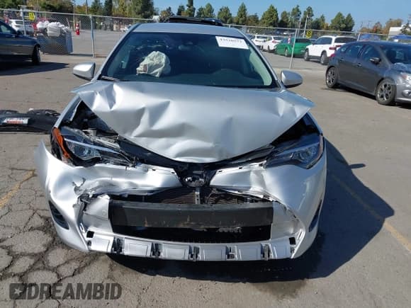✅ 2018 Toyota Corolla LE • VIN: 5YFBURHE5JP815206 • Lot: 43530572. Listed on IAAI with 83,437 mi. Free auction sales archive from the USA and detailed vehicle history report at DreamBid. Image 13.