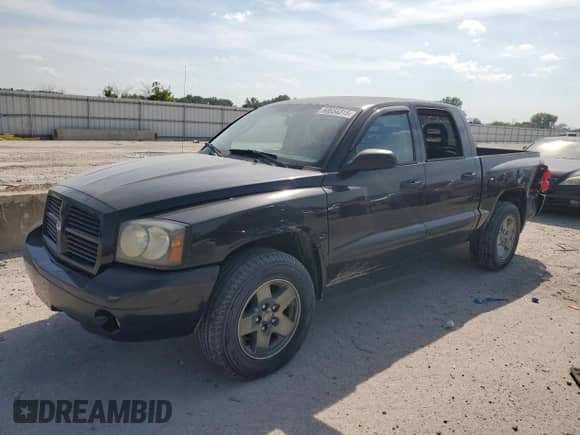 2006 Dodge Dakota SLT z VIN 1D7HE48K36S702687, wystawiony jako Copart lot #68654315 z przebiegiem 210 276 mil mil oraz Szkoda całkowita • Salvage title. Historia ofert i sprzedaży dostępna na DreamBid. Obrazek 1.
