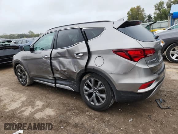 ✅ 2017 Hyundai Santa Fe Ultimate • VIN: 5XYZWDLAXHG484847 • Lot: 89536005. Listed on Copart with 106,847 mi. Free auction sales archive from the USA and detailed vehicle history report at DreamBid. Image 2.