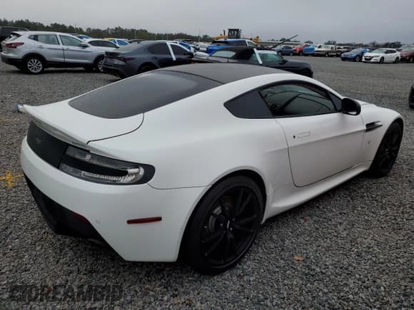 ✅ 2013 Aston Martin Vantage • VIN: SCFEKBAK4DGC17340 • Lot: 85629734. Listed on Copart with 34,975 mi. Free auction sales archive from the USA and detailed vehicle history report at DreamBid. Image 3.