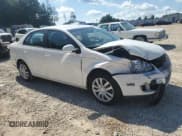 ✅ 2010 Volkswagen Jetta S • VIN: 3VWJX7AJ3AM075822 • Lot: 71417695. Listed on Copart with 214,784 mi. Free auction sales archive from the USA and detailed vehicle history report at DreamBid. Image 4.