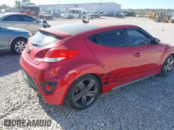 ✅ 2015 Hyundai Veloster Turbo R-Spec • VIN: KMHTC6AE2FU241010 • Lot: 43620094. Listed on IAAI with 90,940 mi. Free auction sales archive from the USA and detailed vehicle history report at DreamBid. Image 4.