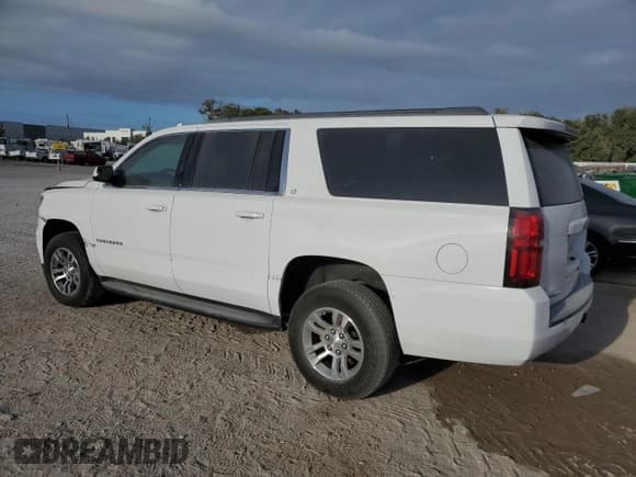 ✅ 2020 Chevrolet Suburban LT • VIN: 1GNSKHKC6LR243991 • Lot: 77182734. Wystawiony na Copart z przebiegiem Nie podano. Bezpłatny archiwum sprzedaży aukcyjnych z USA i szczegółowy raport historii pojazdu na DreamBid. Zdjęcie 2.