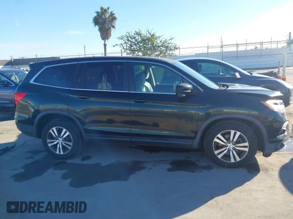 ✅ 2016 Honda Pilot EX • VIN: 5FNYF5H37GB051889 • Lot: 43816009. Listed on IAAI with 66,351 mi. Free auction sales archive from the USA and detailed vehicle history report at DreamBid. Image 13.