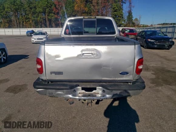 ✅ 1998 Ford F-150 XL • VIN: 2FTZX08W2WCA36561 • Lot: 94142665. Listed on Copart with 206,661 mi. Free auction sales archive from the USA and detailed vehicle history report at DreamBid. Image 6.