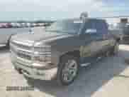 2014 Chevrolet Silverado 1500 LTZ with VIN 3GCUKSEC2EG128866, listed as a Copart auction lot 67001695 with 186,402 mi miles and Salvage title. Bid and sale history available at DreamBid. Image 1.