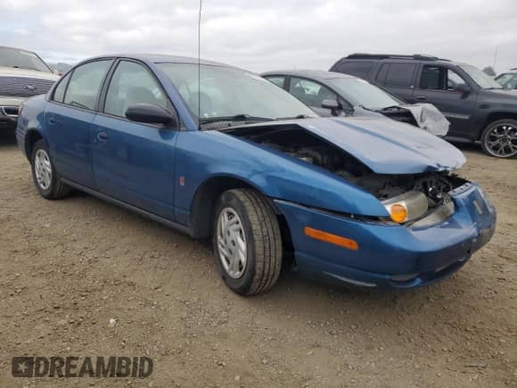 2002 Saturn SL z VIN 1G8ZF52872Z183427, wystawiony jako Copart lot #42719665 z przebiegiem 154 393 mil mil oraz Szkoda całkowita • Salvage title. Historia ofert i sprzedaży dostępna na DreamBid. Obrazek 4.