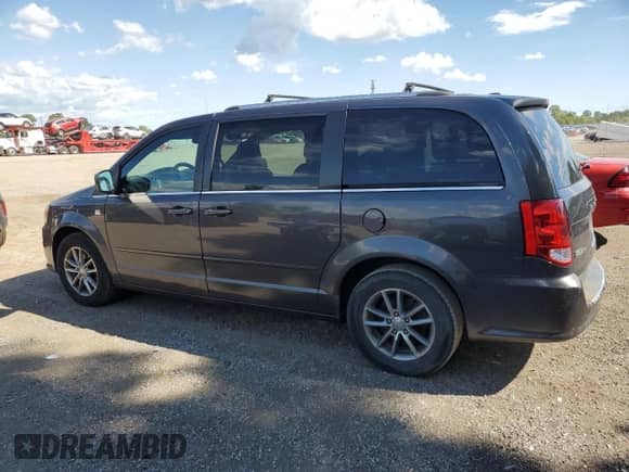 2014 Dodge Grand Caravan SE with VIN 2C4RDGBG4ER301933, listed as a Copart auction lot 70997645 with 222,575 mi miles and Clean title. Bid and sale history available at DreamBid. Image 2.