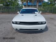 ✅ 2013 Dodge Challenger SXT • VIN: 2C3CDYAG5DH693813 • Lot: 43558979. Listed on IAAI with 188,863 mi. Free auction sales archive from the USA and detailed vehicle history report at DreamBid. Image 12.