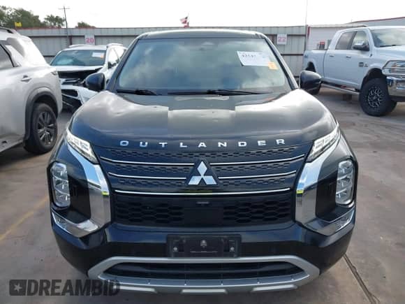2023 Mitsubishi Outlander SE with VIN JA4T5UA97PZ058755, listed as a IAAI auction lot 42543170 with 66,418 mi miles and . Bid and sale history available at DreamBid. Image 12.